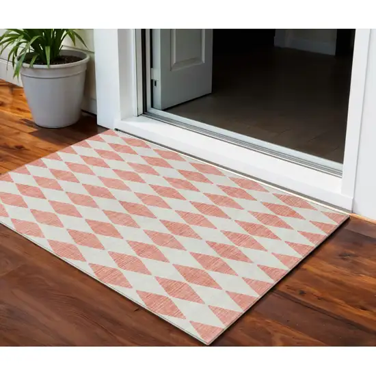 Salmon Geometric Washable Indoor Outdoor Area Rug Photo 1