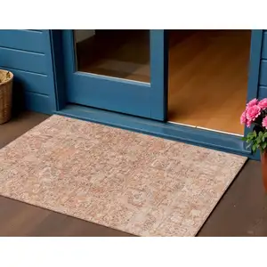 Photo of Salmon Orange And Gray Floral Washable Indoor Outdoor Area Rug