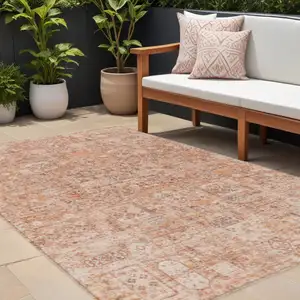 Photo of Salmon Orange And Gray Floral Washable Indoor Outdoor Area Rug