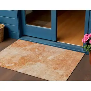 Photo of Salmon Peach And Ivory Nautical Washable Indoor Outdoor Area Rug