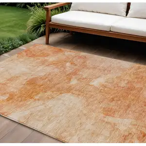 Photo of Salmon Peach And Ivory Nautical Washable Indoor Outdoor Area Rug