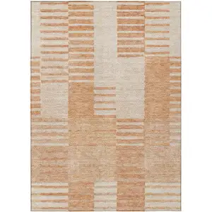 Photo of Salmon Peach And Ivory Striped Washable Indoor Outdoor Area Rug