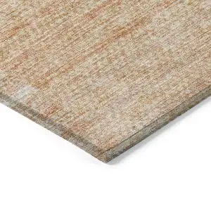 Photo of Salmon Peach And Ivory Striped Washable Indoor Outdoor Area Rug