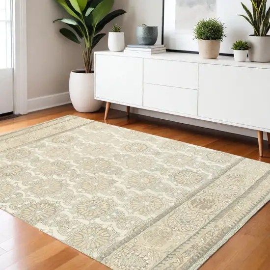 Sand Wool Floral Hand Tufted Area Rug Photo 1