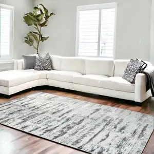 Photo of Silver Abstract Washable Non Skid Area Rug With Fringe