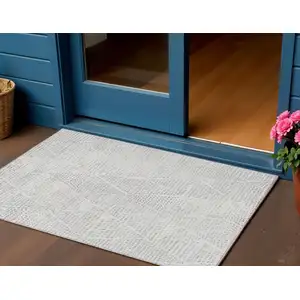 Photo of Silver And Ivory Geometric Washable Indoor Outdoor Area Rug