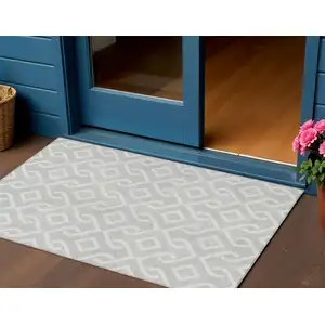 Photo of Silver And Ivory Geometric Washable Indoor Outdoor Area Rug