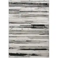 Photo of Silver Gray And Black Abstract Stain Resistant Area Rug