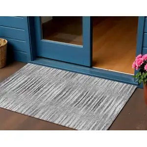 Photo of Silver Gray And Charcoal Striped Washable Indoor Outdoor Area Rug