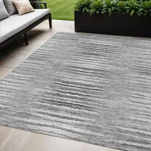 Photo of Silver Gray And Charcoal Striped Washable Indoor Outdoor Area Rug