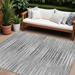 Photo of Silver Gray And Charcoal Striped Washable Indoor Outdoor Area Rug