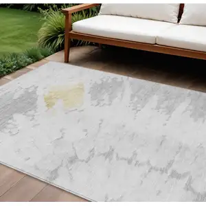 Photo of Silver Gray And Ivory Abstract Washable Indoor Outdoor Area Rug