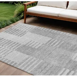 Photo of Silver Gray And Ivory Striped Washable Indoor Outdoor Area Rug