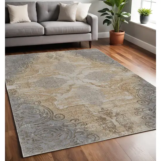 Tan and Gray Floral Power Loom Non Skid Area Rug Photo 1