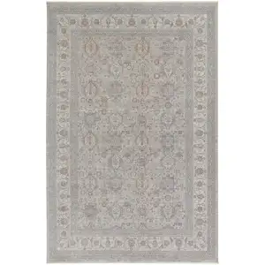 Photo of Silver Taupe and Blue Oriental Power Loom Worn Faded Area Rug With Fringe