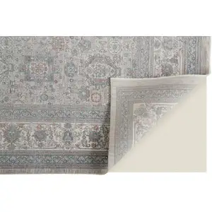 Photo of Silver Taupe and Blue Oriental Power Loom Worn Faded Area Rug With Fringe