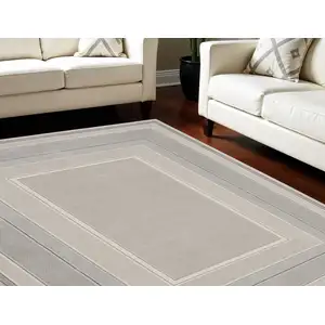 Photo of Silver and Ivory Geometric Non Skid Area Rug