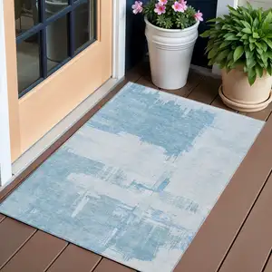 Photo of Sky Blue And Denim Blue Abstract Washable Indoor Outdoor Area Rug