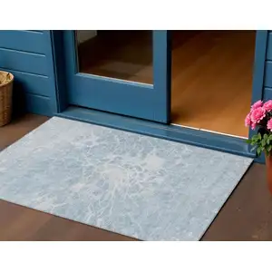 Photo of Sky Blue And Denim Blue Abstract Washable Indoor Outdoor Area Rug