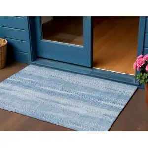 Photo of Sky Blue And Denim Blue Botanical Leaves Washable Indoor Outdoor Area Rug