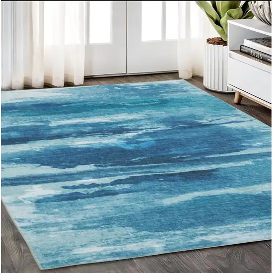 Sky Blue And Ivory Abstract Distressed Area Rug Photo 1