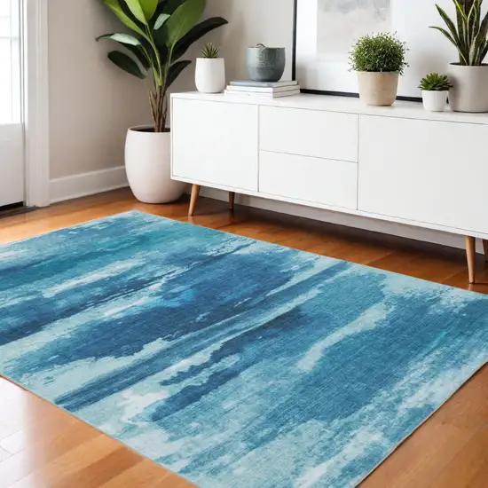 Sky Blue And Ivory Abstract Distressed Area Rug Photo 1