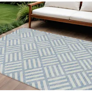 Photo of Sky Blue And Ivory Geometric Washable Indoor Outdoor Area Rug