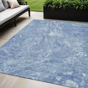 Photo of Sky Blue And Navy Blue Abstract Washable Indoor Outdoor Area Rug