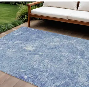 Photo of Sky Blue And Navy Blue Abstract Washable Indoor Outdoor Area Rug