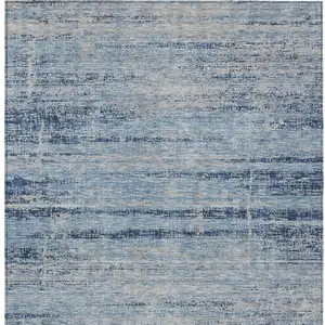 Photo of Sky Blue And Navy Blue Abstract Washable Indoor Outdoor Area Rug