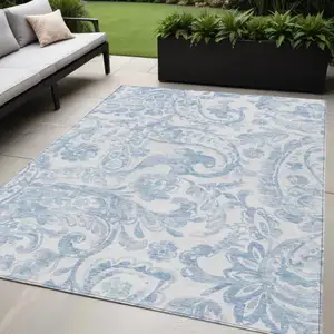 Photo of Sky Blue Denim Blue And Ivory Paisley Washable Indoor Outdoor Area Rug