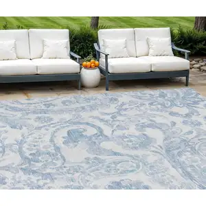 Photo of Sky Blue Denim Blue And Ivory Paisley Washable Indoor Outdoor Area Rug