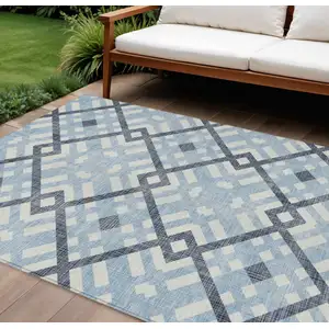 Photo of Sky Blue Navy Blue And Ivory Geometric Washable Indoor Outdoor Area Rug