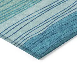 Photo of Sky Blue Teal Blue And Aqua Striped Washable Indoor Outdoor Area Rug