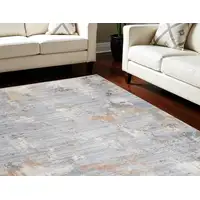 Photo of Slate Blue Abstract Area Rug With Fringe