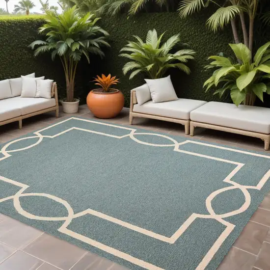 Gray and Ivory Round Handmade Indoor Outdoor Area Rug Photo 1