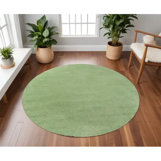 8' Green Round Hand Woven Area Rug Photo 1