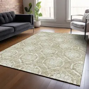 Photo of Tan And Beige Medallion Washable Indoor Outdoor Area Rug