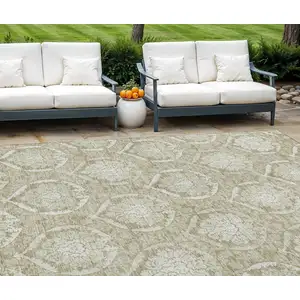 Photo of Tan And Beige Medallion Washable Indoor Outdoor Area Rug