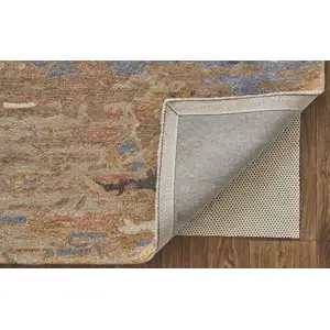 Photo of Tan And Blue Wool Abstract Tufted Handmade Stain Resistant Area Rug