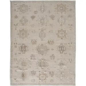 Photo of Tan And Brown Floral Hand Knotted Stain Resistant Area Rug