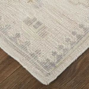 Photo of Tan And Brown Floral Hand Knotted Stain Resistant Area Rug