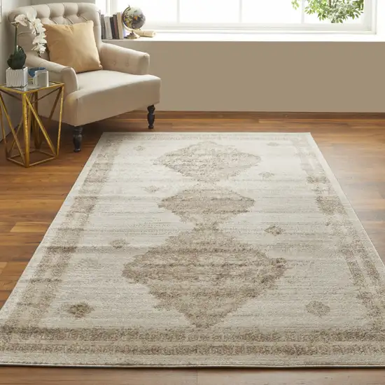 Tan And Ivory Geometric Power Loom Distressed Area Rug Photo 6