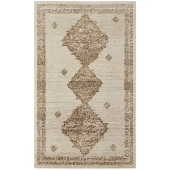 Tan And Ivory Geometric Power Loom Distressed Area Rug Photo 1