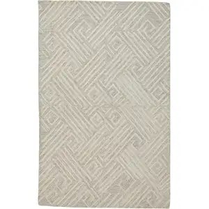 Photo of Tan And Ivory Wool Geometric Tufted Handmade Stain Resistant Area Rug