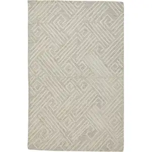 Photo of Tan And Ivory Wool Geometric Tufted Handmade Stain Resistant Area Rug