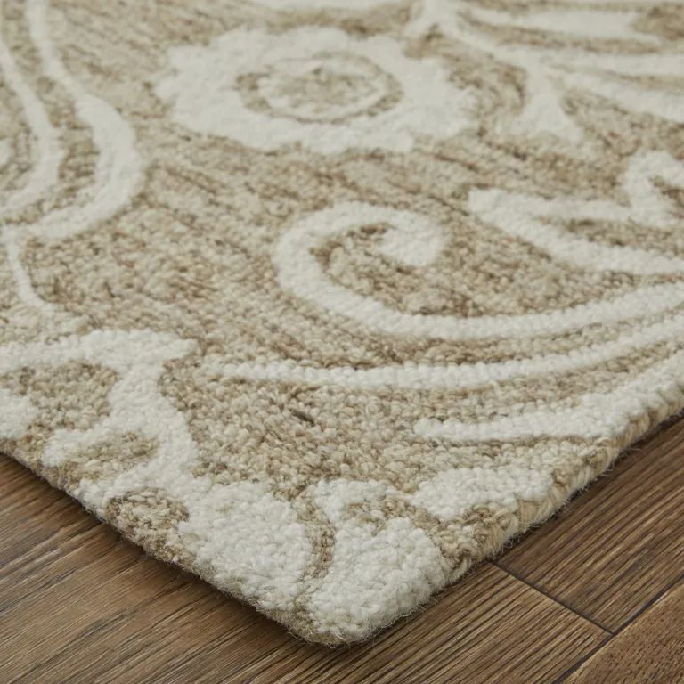 Tan And Ivory Wool Paisley Tufted Handmade Stain Resistant Area Rug Photo 4