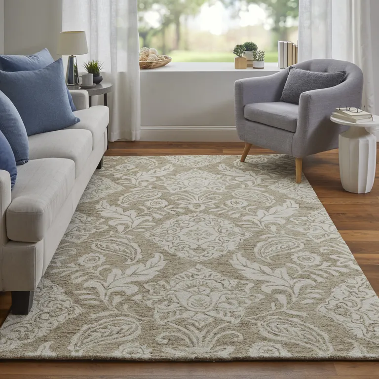 Tan And Ivory Wool Paisley Tufted Handmade Stain Resistant Area Rug Photo 1