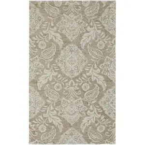 Photo of Tan And Ivory Wool Paisley Tufted Handmade Stain Resistant Area Rug