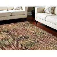 Photo of Tan Black and Red Striped Non Skid Area Rug